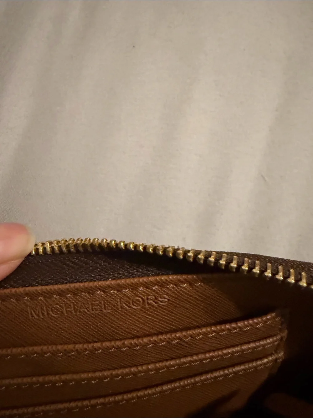 Michael Kors Brown MK Logo Zip Wallet with Gold Hardware